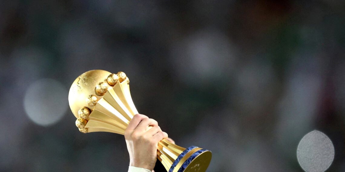 FILE PHOTO: Soccer Football - Africa Cup of Nations 2019 - Final - Senegal v Algeria - Cairo International Stadium, Cairo, Egypt - July 19, 2019    Algeria celebrate winning the Africa Cup of Nations with the trophy. REUTERS/Sumaya Hisham/File Photo