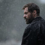 Hugh Jackman Unrecognizable in First Look at The Death Of Robin Hood with Jodie Comer and Bill Skarsgård
