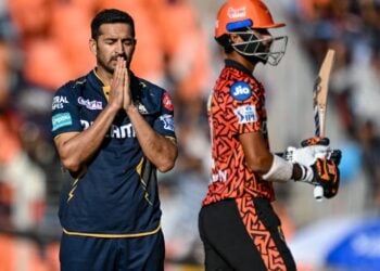Gujarat Titans' Mohit Sharma celebrates after taking the wicket of Sunrisers Hyderabad's Washington Sundar (R) during the Indian Premier League (IPL) Twenty20 cricket match between Gujarat Titans and Sunrisers Hyderabad at the Narendra Modi Stadium in Ahmedabad on March 31, 2024. (Photo by Sajjad HUSSAIN / AFP) / -- IMAGE RESTRICTED TO EDITORIAL USE - STRICTLY NO COMMERCIAL USE -- (Photo by SAJJAD HUSSAIN/AFP via Getty Images)
