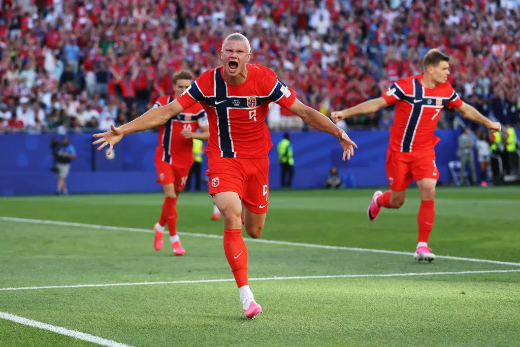 Why Do Footballers Wear Pink Boots?
