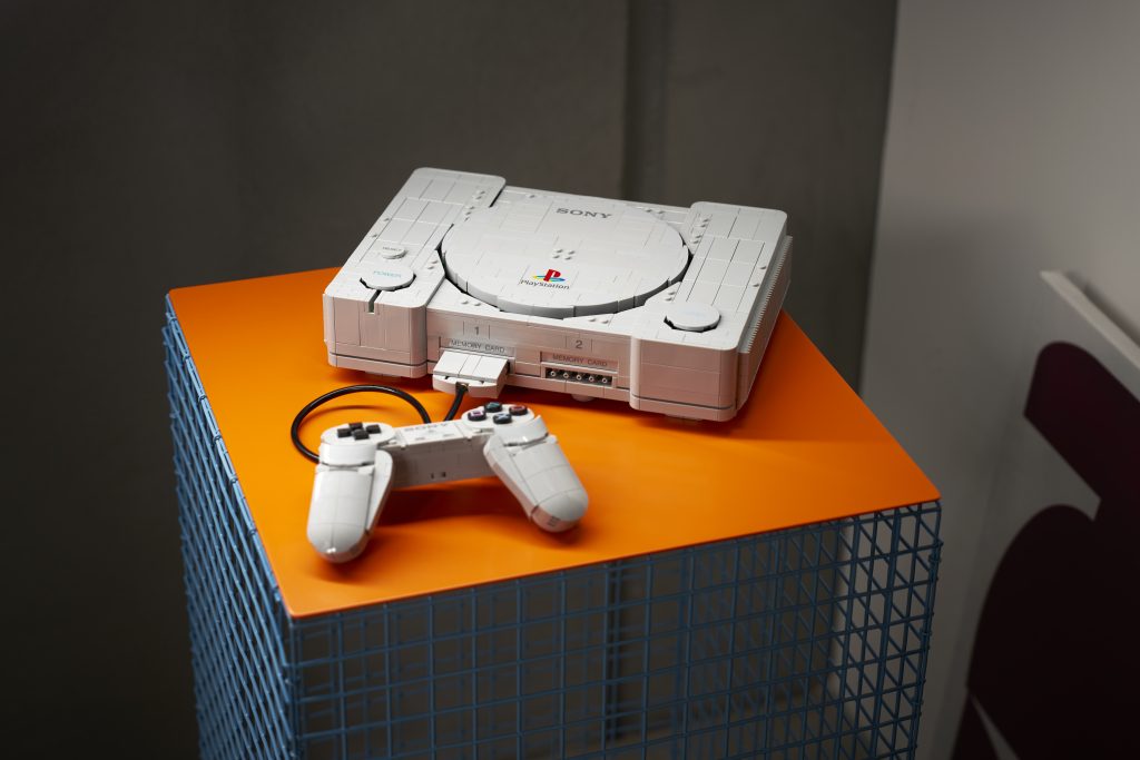LEGO PlayStation 72306 set displayed as a brick-built recreation of the original 1994 Sony console