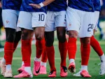 Why Do Footballers Wear Pink Boots?